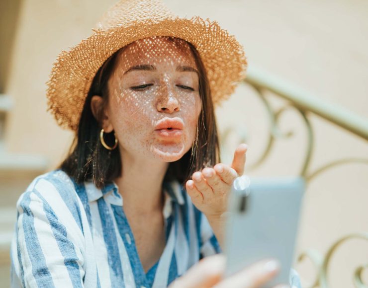 woman-making-a-video-call-from-her-phone-J8L7AKF.jpg